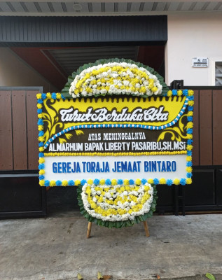 Papan Bunga Duka di Kebun Dahri